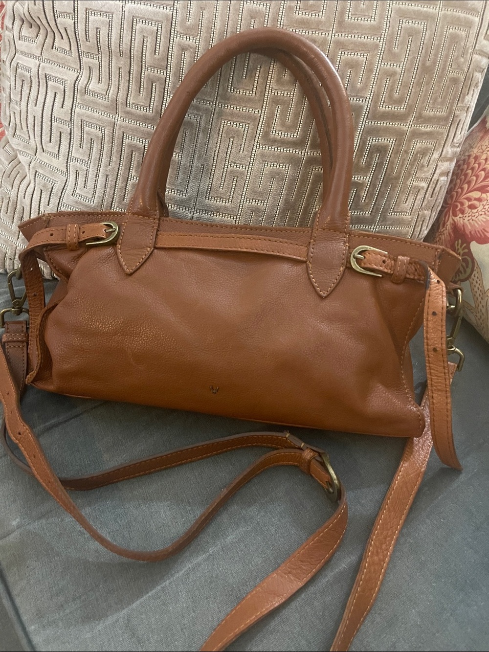 Classic Brown Leather Satchel with Dual Handles and Detachable Strap